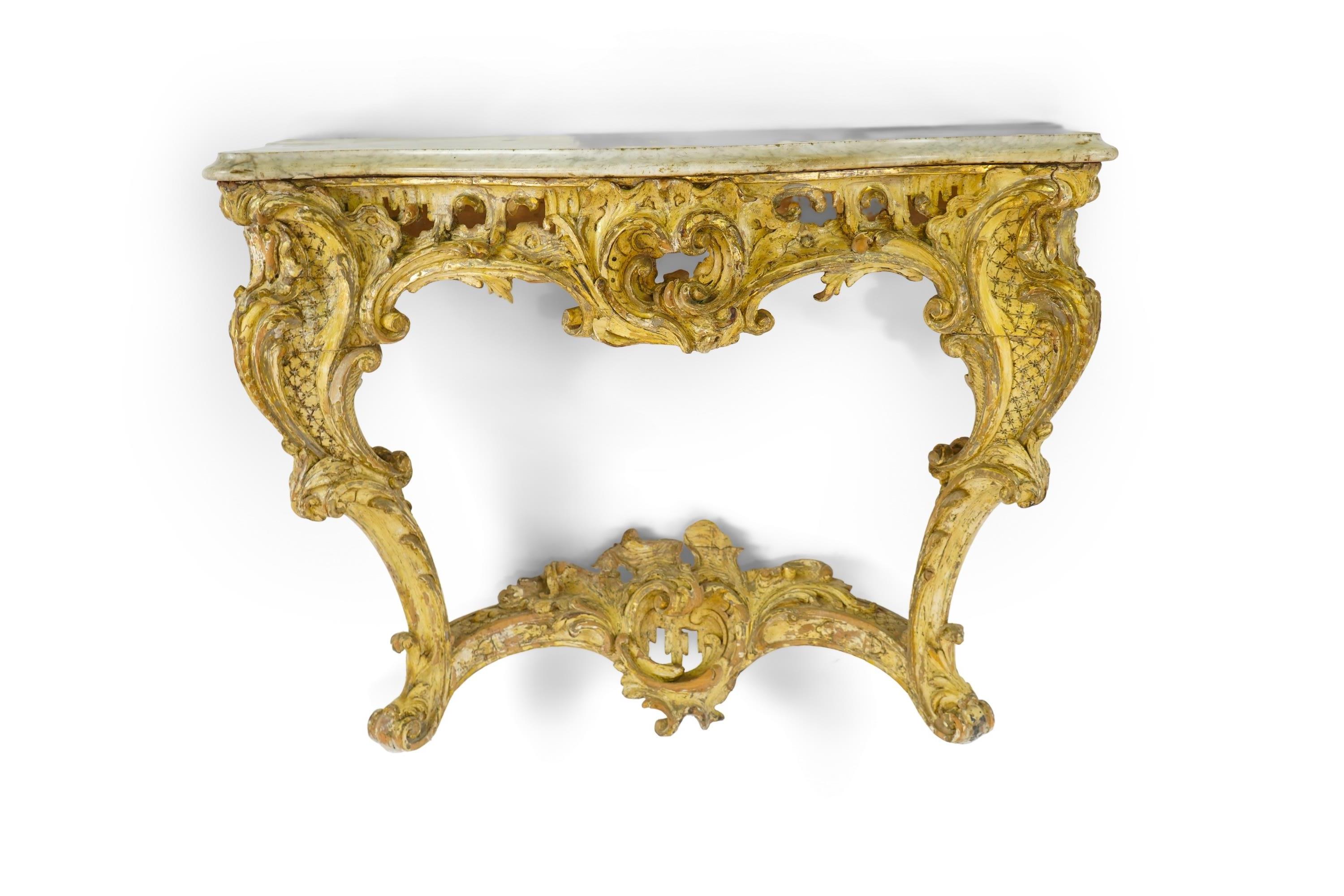A 19th century Louis XIV style giltwood and composition serpentine console table